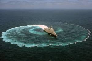     littoral combat ship, USS Independence, demonstrates its maneuvering capabi ...
